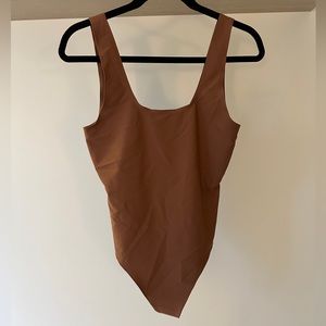 brown bodysuit